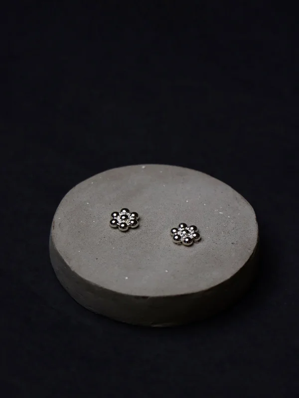 Puvvu Studs in Silver Tone