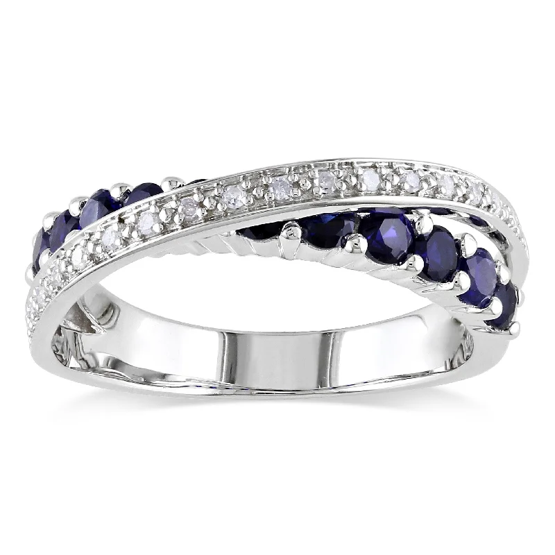 Miadora Sterling Silver Blue Sapphire and 1/10ct TDW Diamond Crossover Ring